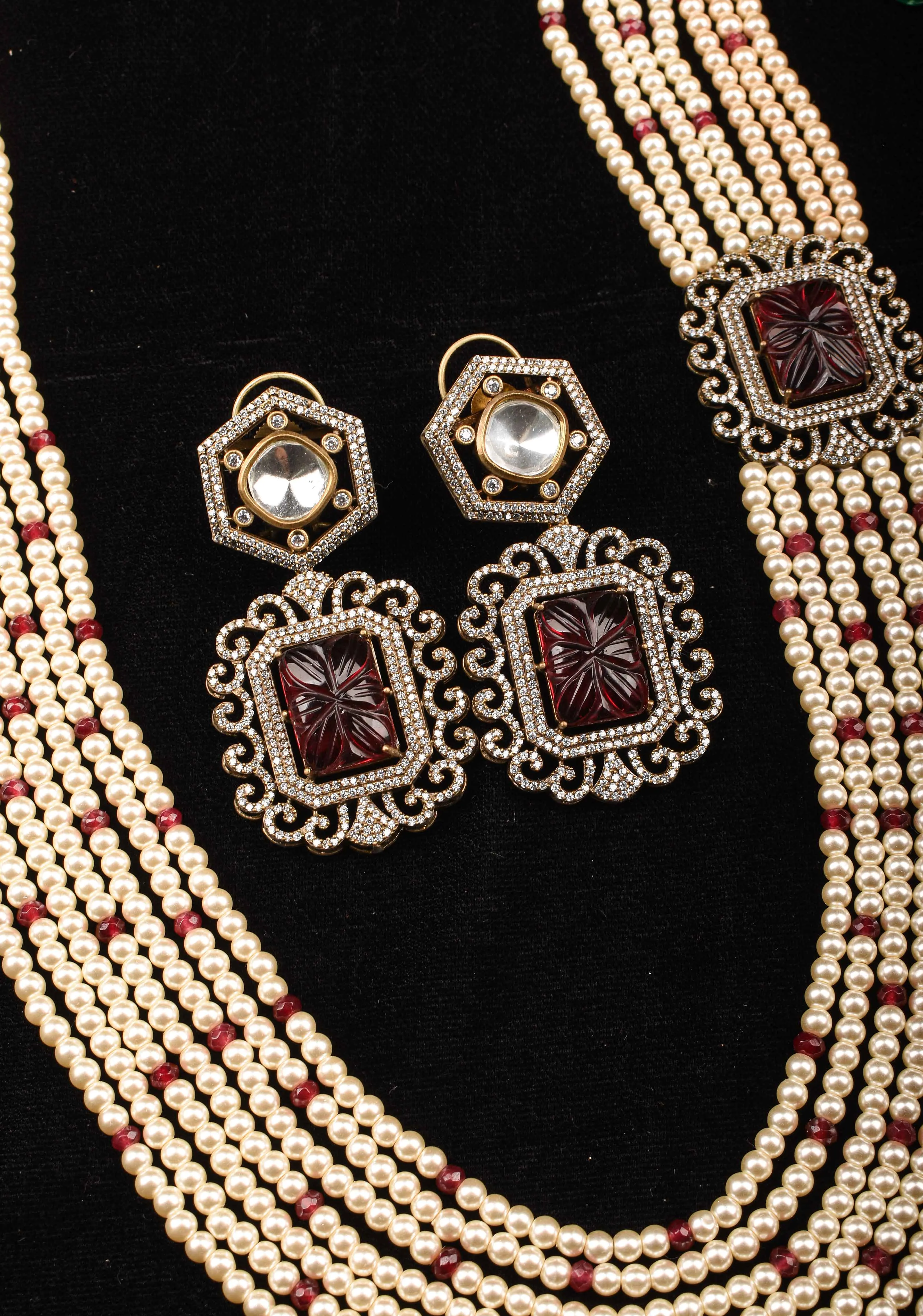 Carved stone unit on Multistrand Haar and Matching Earrings | Shobitam Jewelry