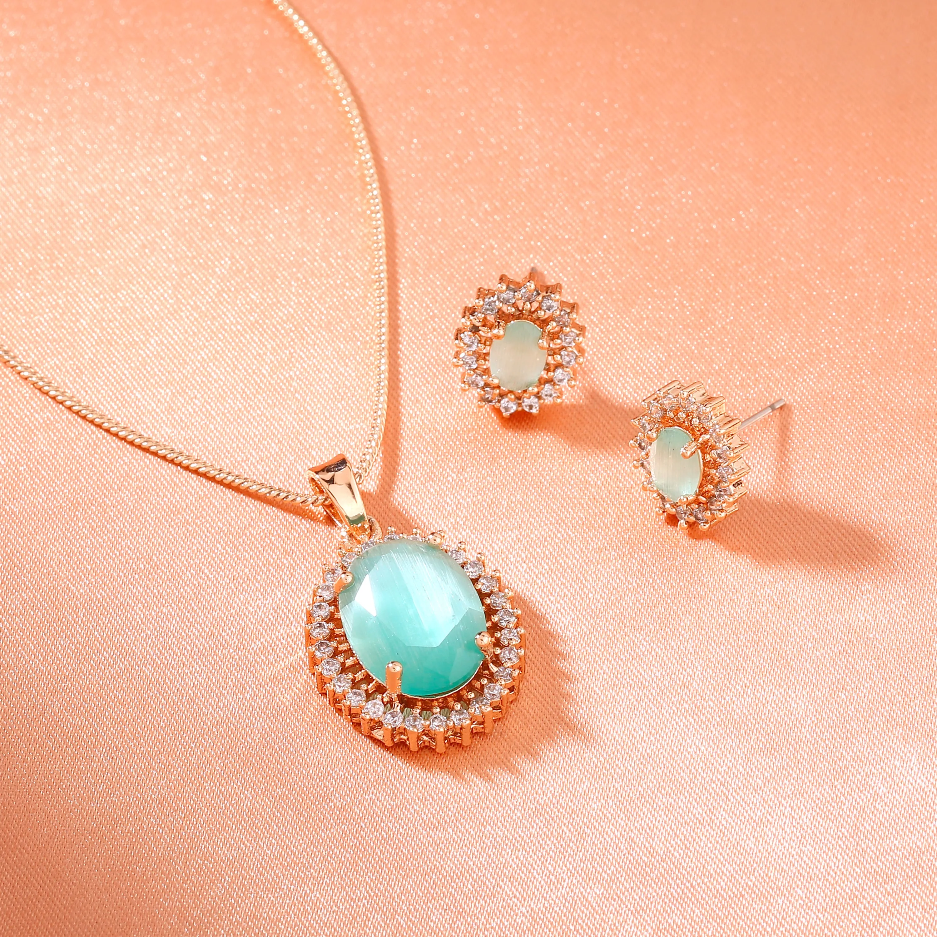 Estele Rosegold Plated CZ Beautiful Oval Designer Pendant Set with Mint Green Stones for Women