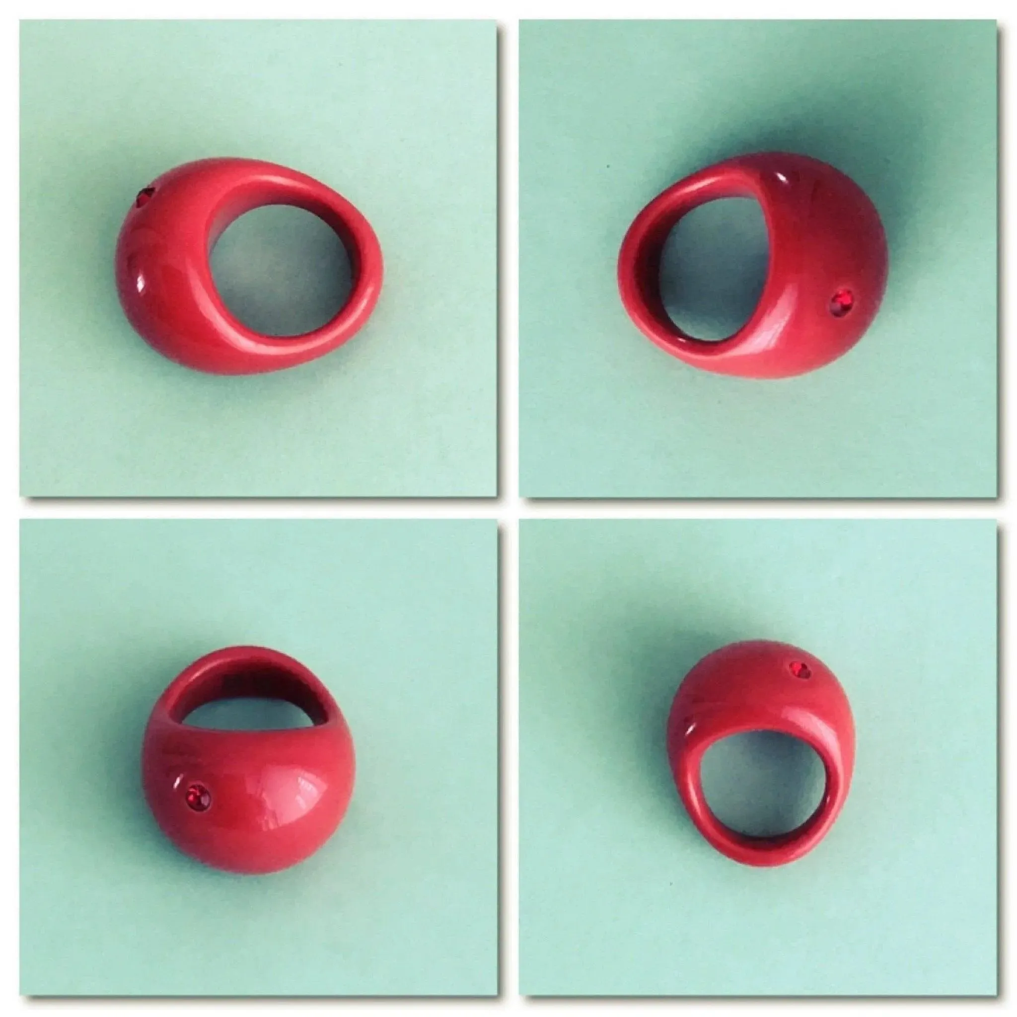 Fluid shape red dome statement ring ruby colored crystal inset
